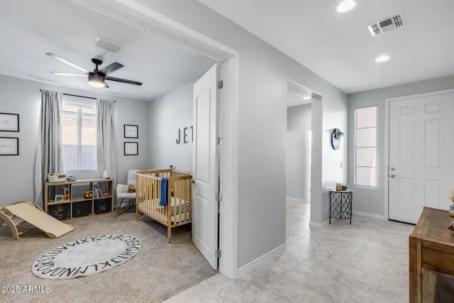a living room with furniture and a table