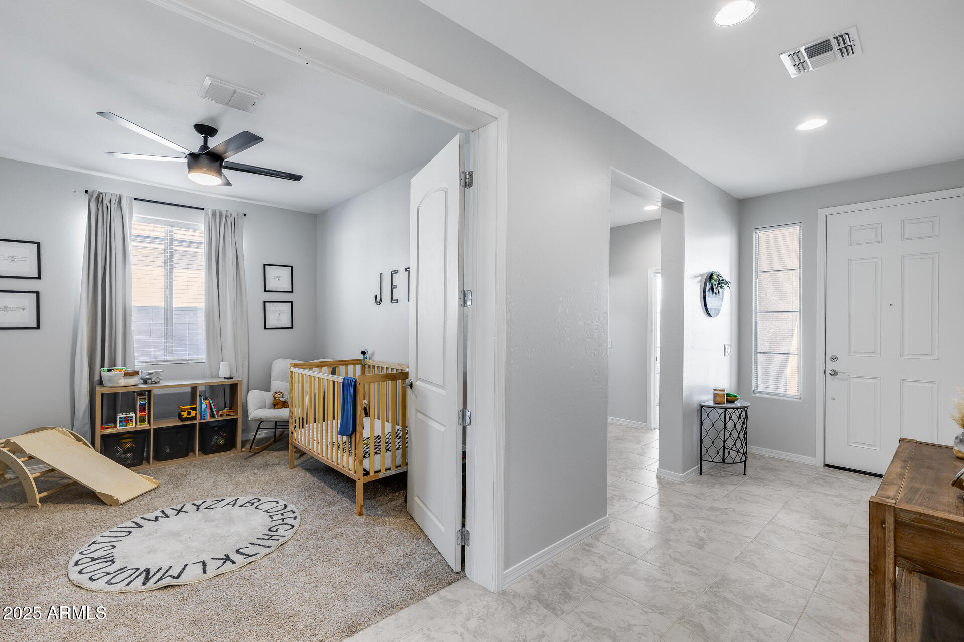 14866 West Sand Hills Road Surprise, AZ 85387 - Photo 13 of 54 a living room with furniture and a table