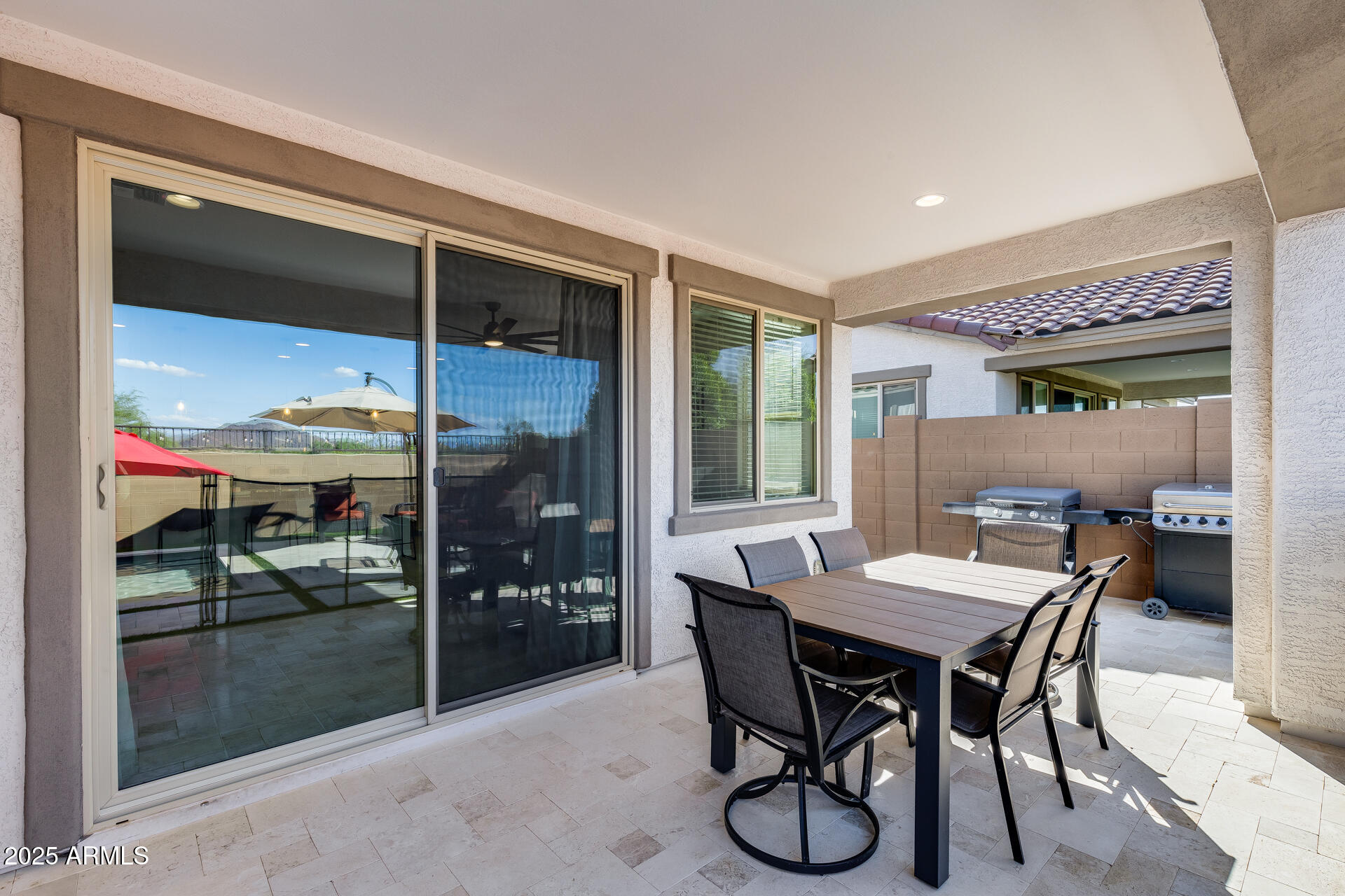 14866 West Sand Hills Road Surprise, AZ 85387 - Photo 31 of 54 a view of a dining room with furniture