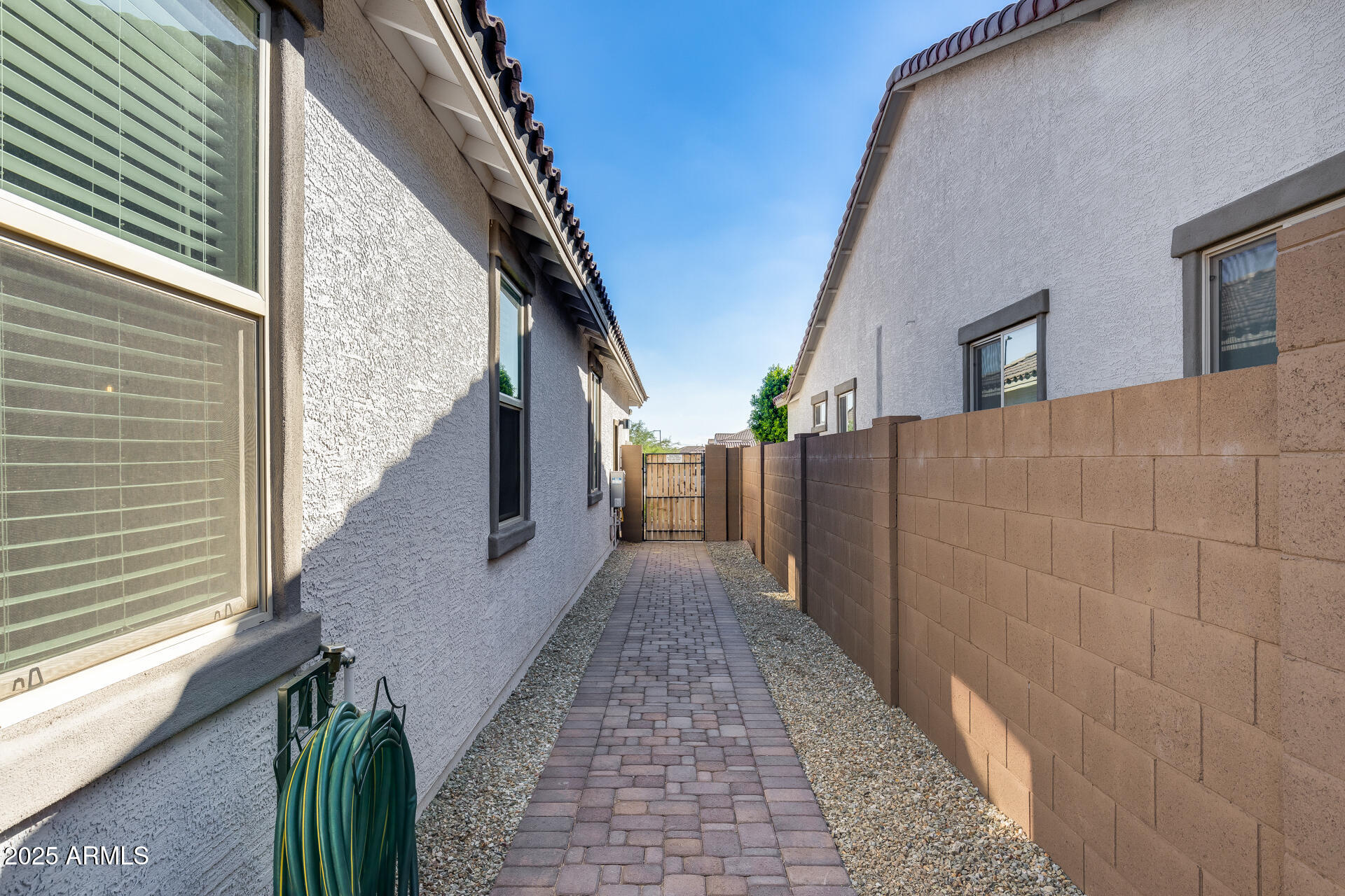 14866 West Sand Hills Road Surprise, AZ 85387 - Photo 40 of 54 a view of a pathway of a building