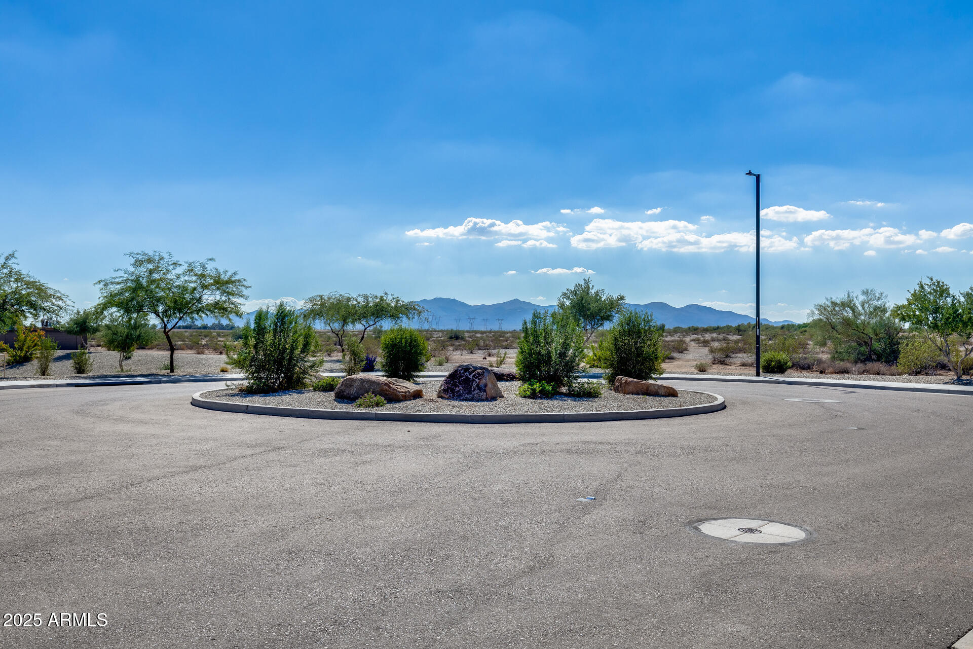 14866 West Sand Hills Road Surprise, AZ 85387 - Photo 46 of 54 a view of a street with a building and a street view