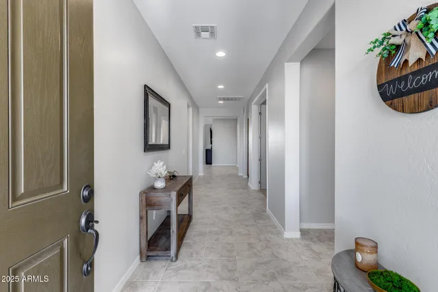 a en suite bathroom with a sink and a mirror