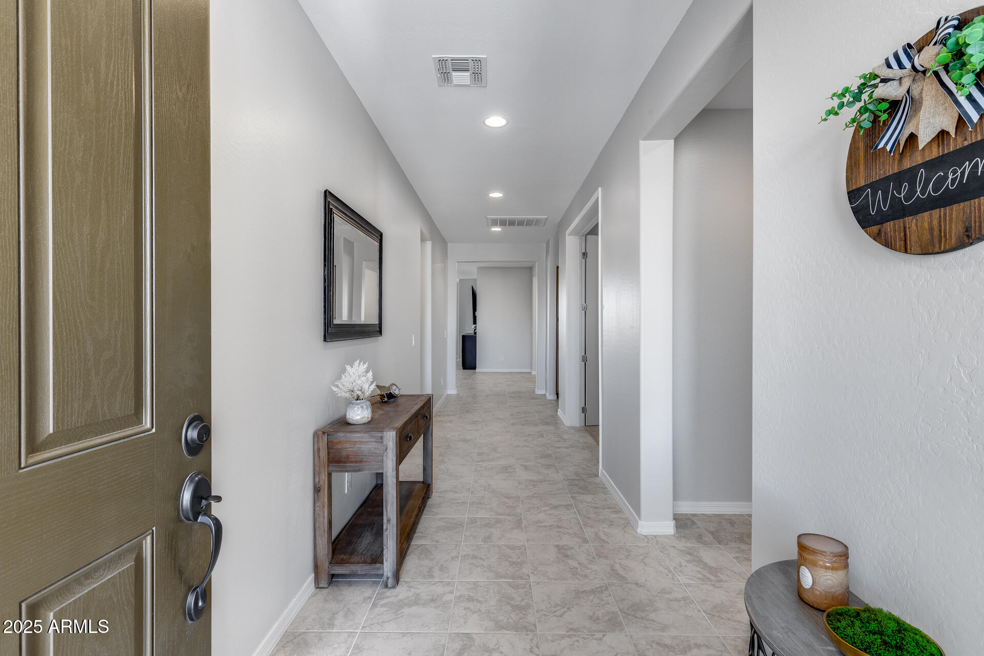 14866 West Sand Hills Road Surprise, AZ 85387 - Photo 7 of 54 a en suite bathroom with a sink and a mirror