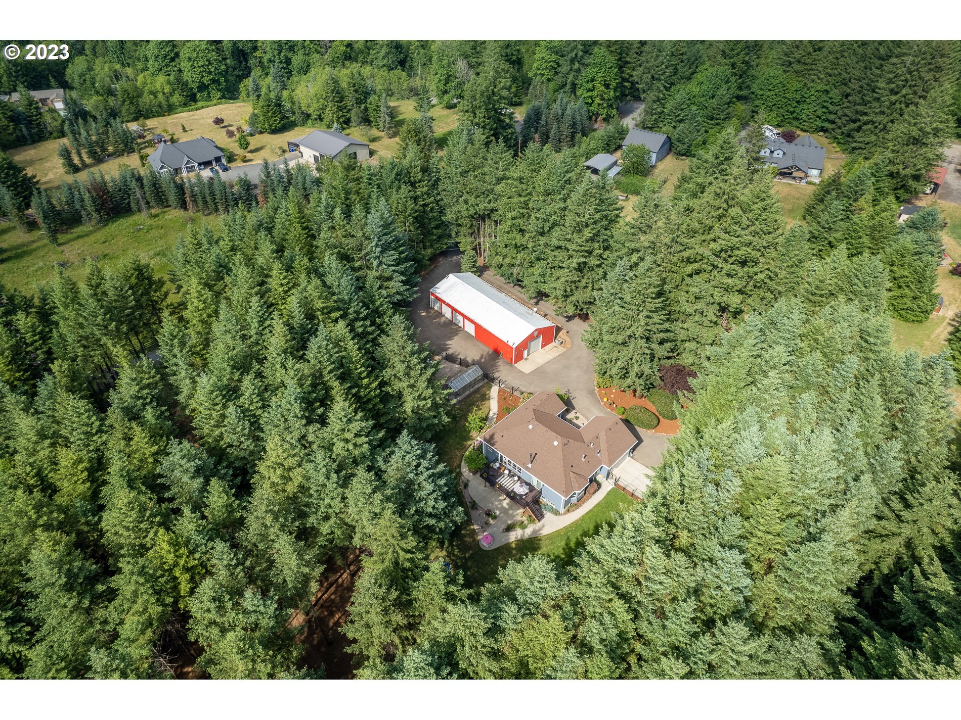 12133 Southeast Laughing Water Road Sandy, OR 97055 - Photo 8 of 47 a aerial view of a house with a yard