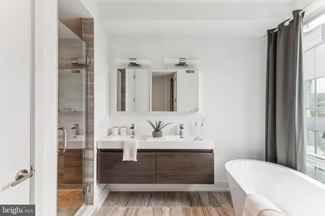 a bedroom with a bed and a television