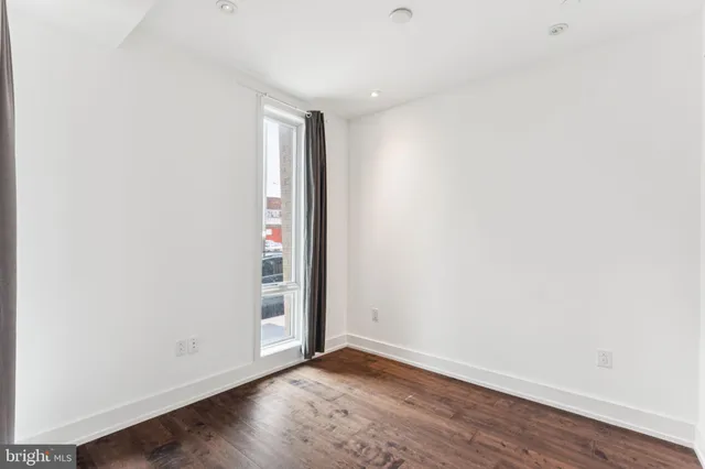 a terrace with a table and chairs