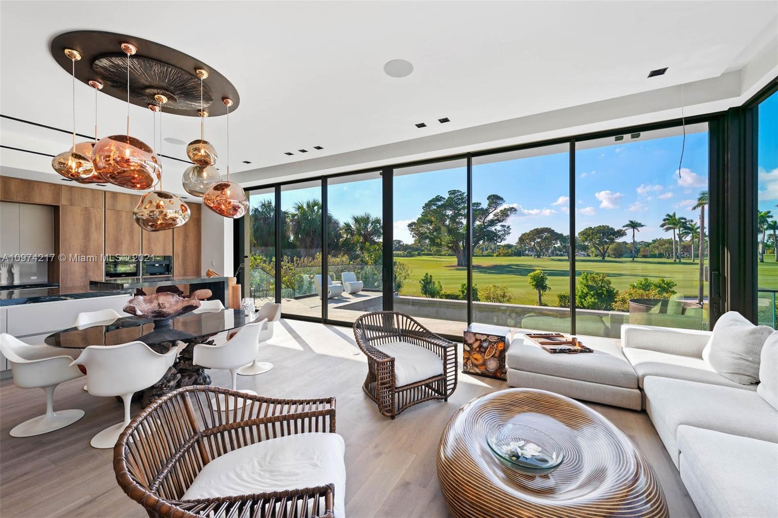 5470 La Gorce Drive Miami Beach, FL 33140 - Photo 12 of 71 a living room with furniture and a large window