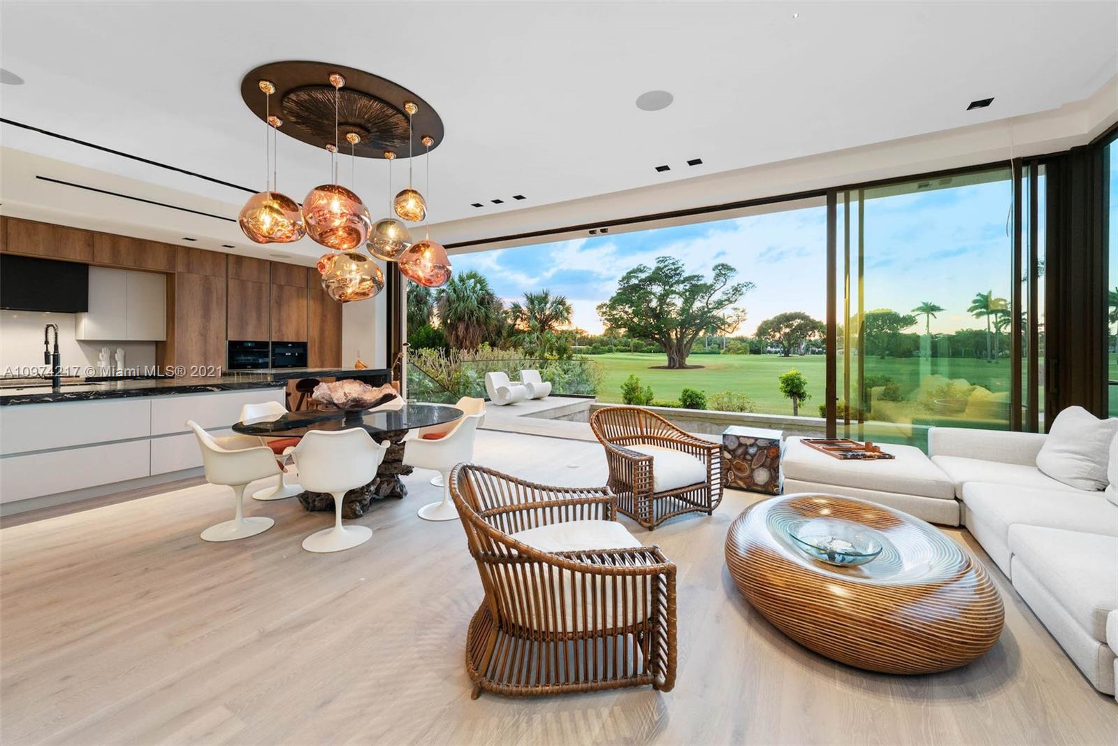5470 La Gorce Drive Miami Beach, FL 33140 - Photo 13 of 71 a living room with furniture and a large window