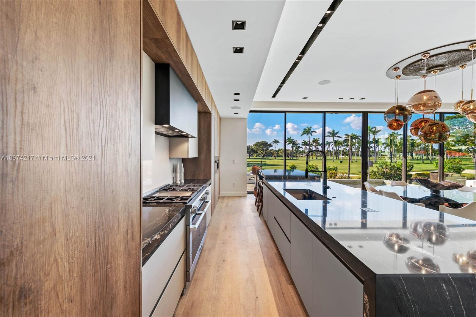 5470 La Gorce Drive Miami Beach, FL 33140 - Photo 17 of 71 a view of a living room and balcony