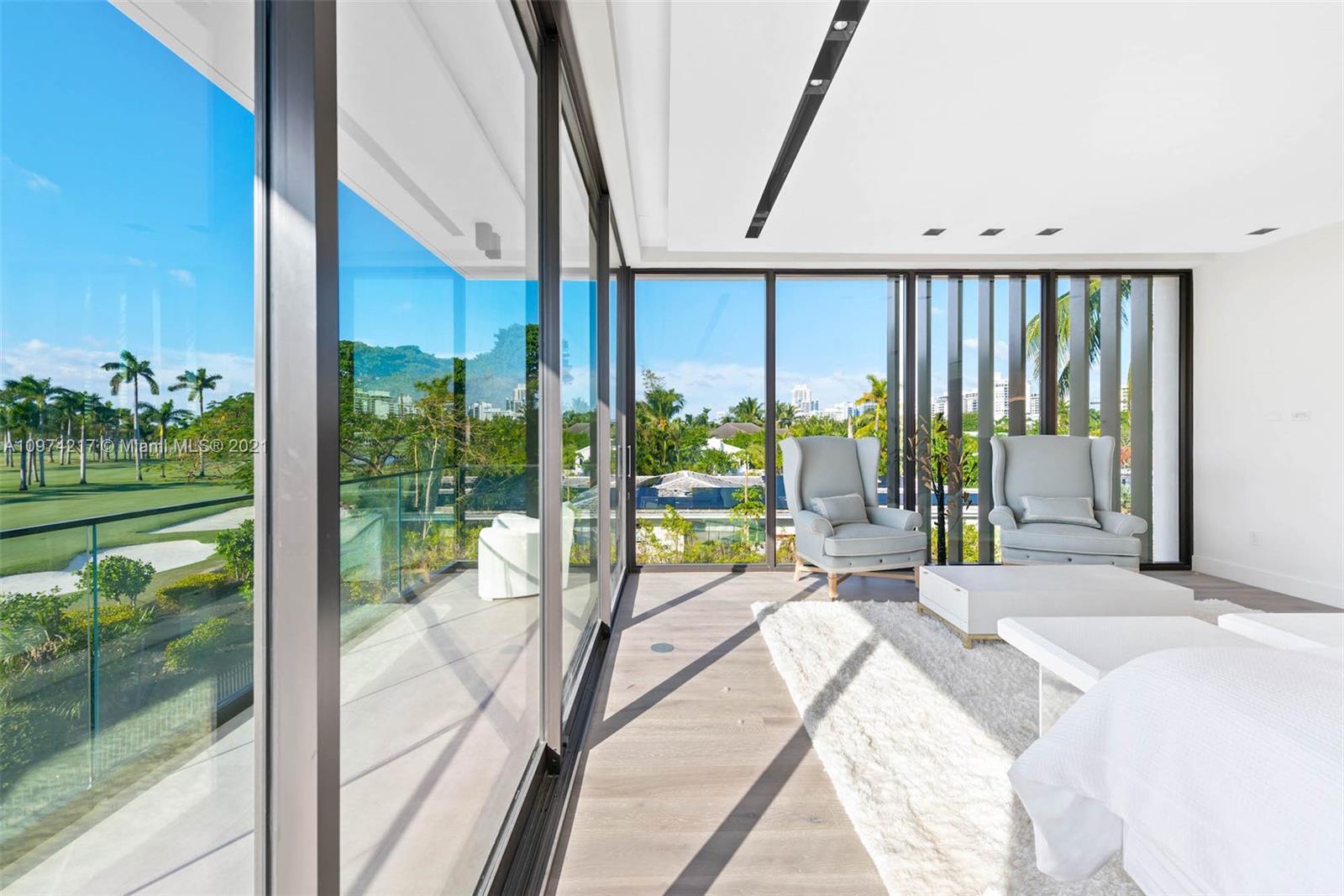 5470 La Gorce Drive Miami Beach, FL 33140 - Photo 33 of 71 a view of a large window with an outdoor space and balcony