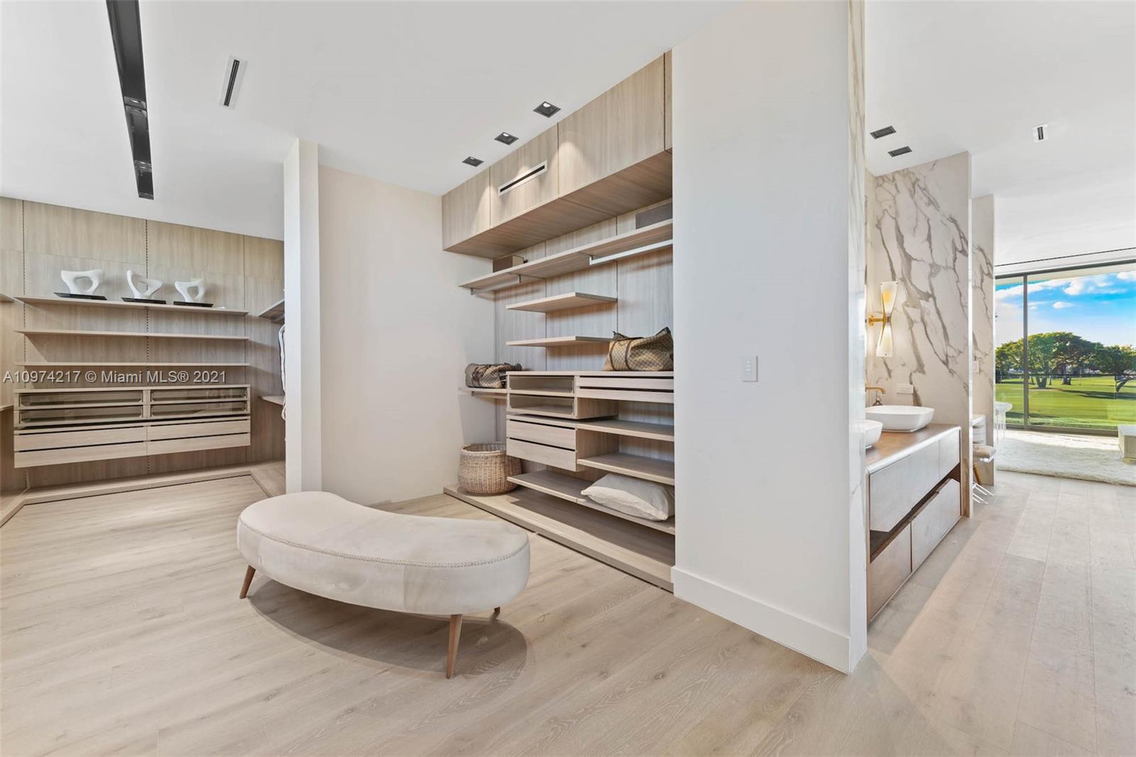 5470 La Gorce Drive Miami Beach, FL 33140 - Photo 38 of 71 a bathroom with a toilet and a sink