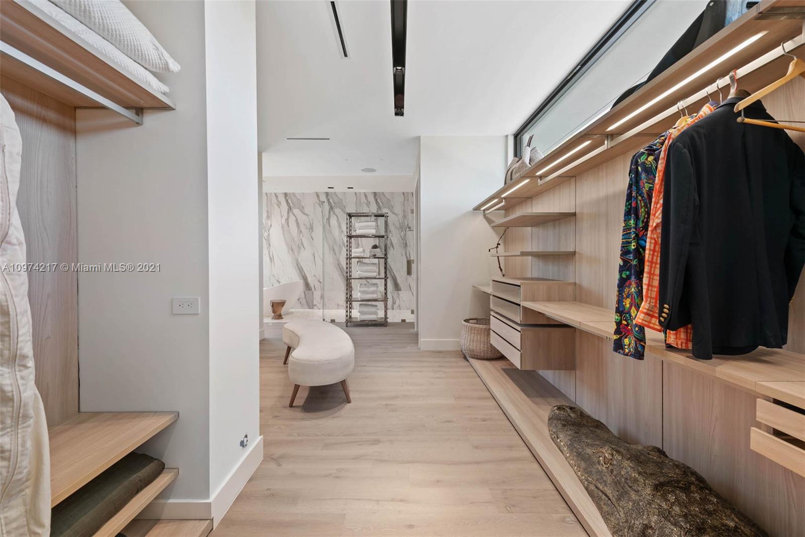 5470 La Gorce Drive Miami Beach, FL 33140 - Photo 40 of 71 a view of hallway with stairs and furniture