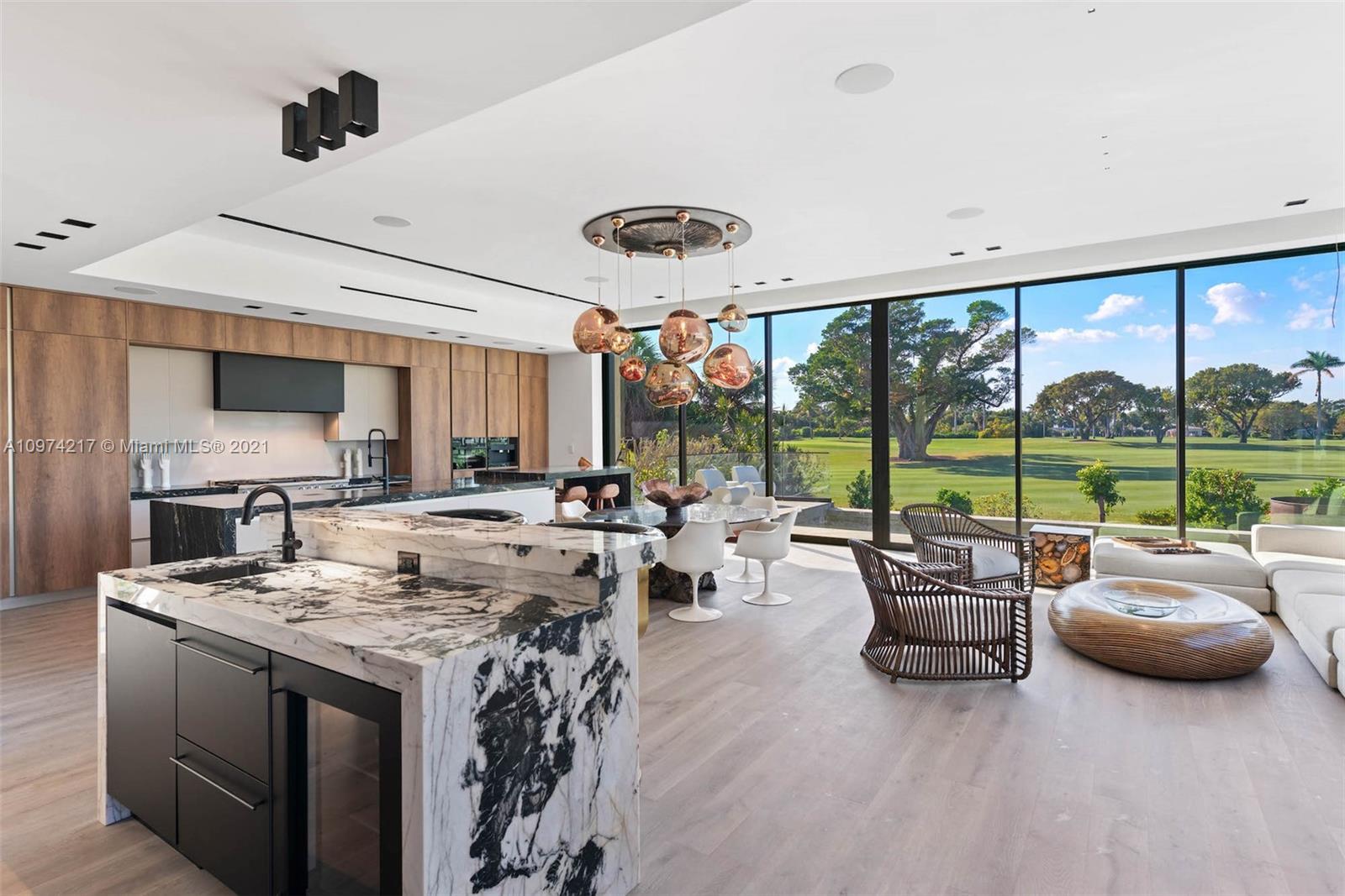 5470 La Gorce Drive Miami Beach, FL 33140 - Photo 5 of 71 a very nice looking living room with a large window and stainless steel appliances