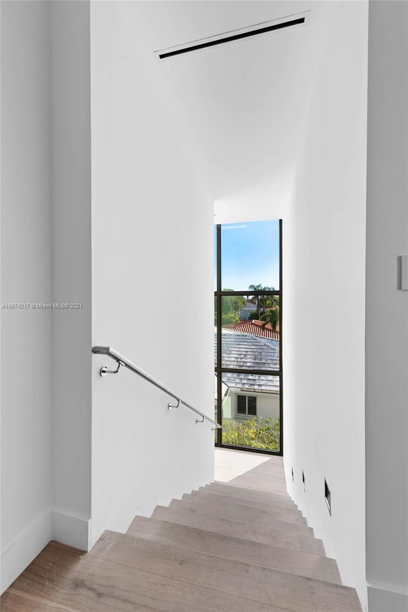 5470 La Gorce Drive Miami Beach, FL 33140 - Photo 53 of 71 a view of a room that has a window in it
