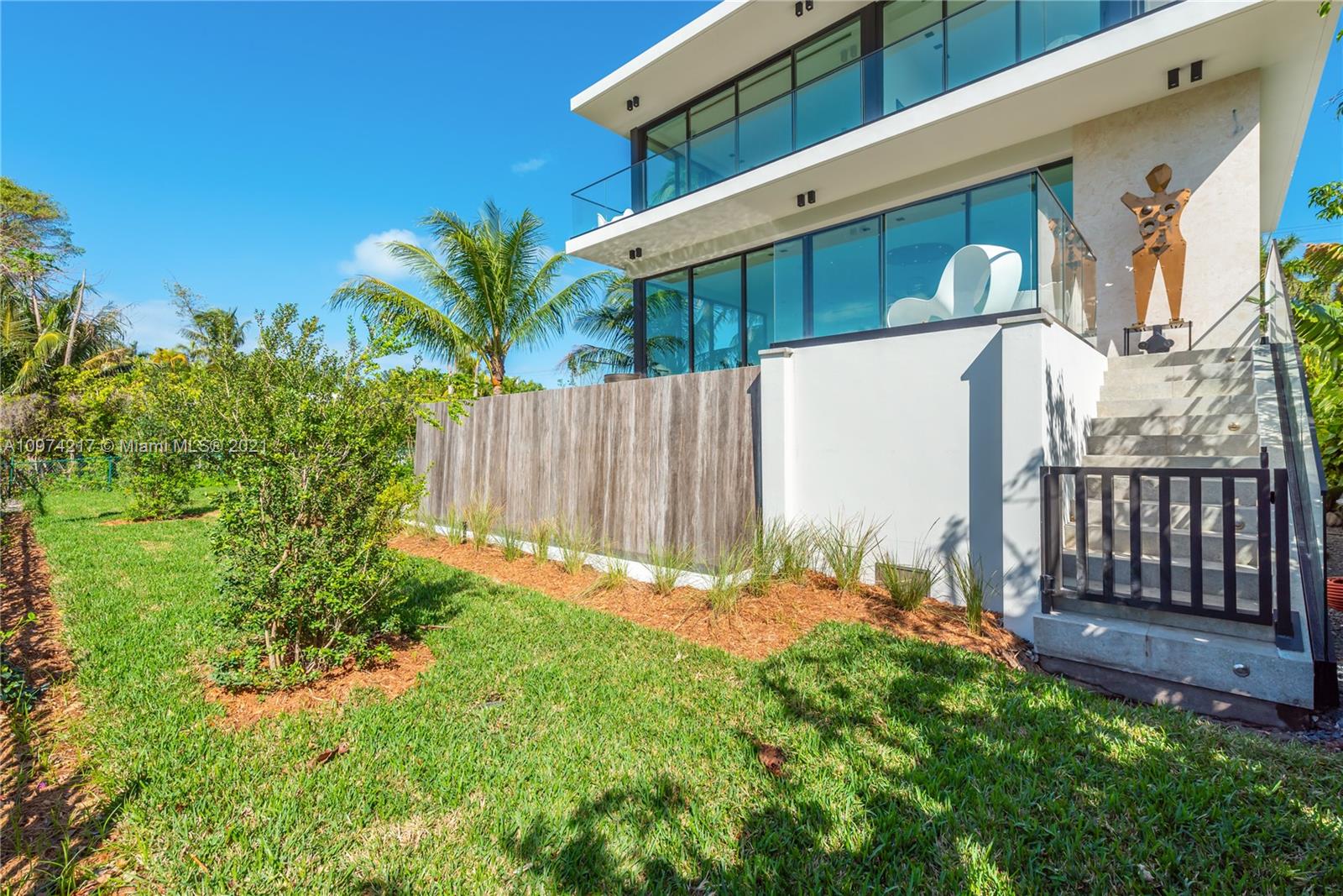 5470 La Gorce Drive Miami Beach, FL 33140 - Photo 62 of 71 a view of a house with a yard