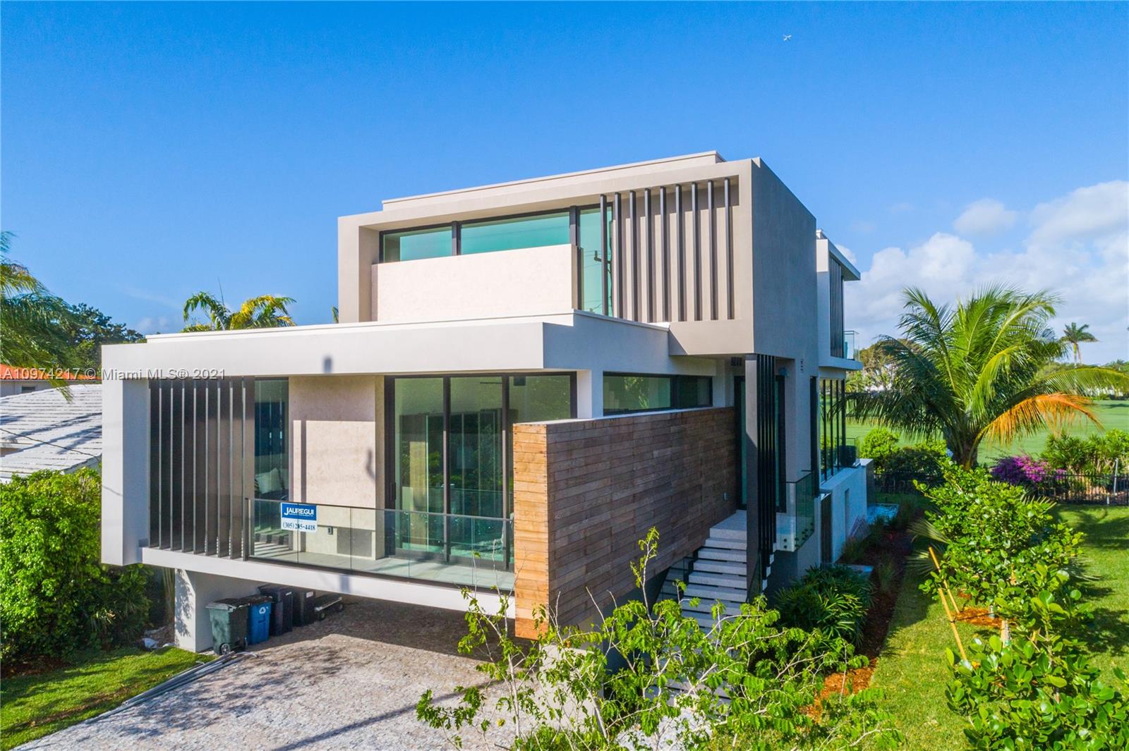5470 La Gorce Drive Miami Beach, FL 33140 - Photo 67 of 71 a front view of a house with garden