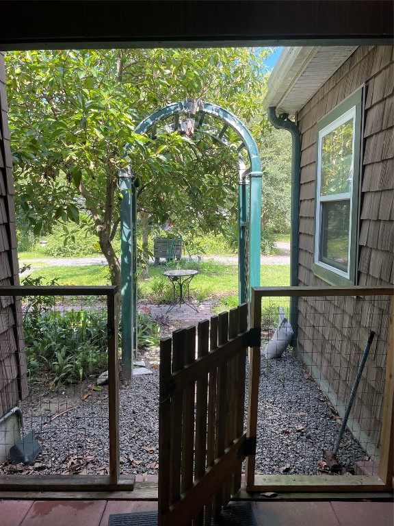 795 Geiger Road Amelia Island, FL 32034 - Photo 12 of 17 a view of a porch with a yard