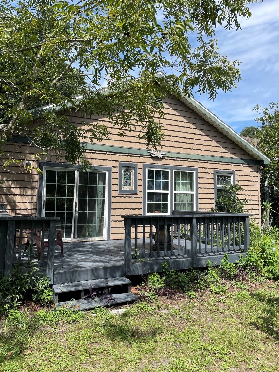 795 Geiger Road Amelia Island, FL 32034 - Photo 13 of 17 a house view with a garden space