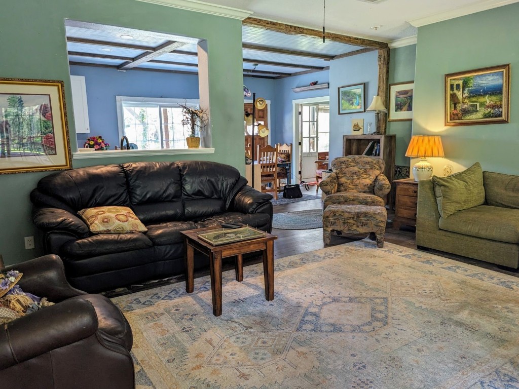795 Geiger Road Amelia Island, FL 32034 - Photo 3 of 17 a living room with furniture and a large window