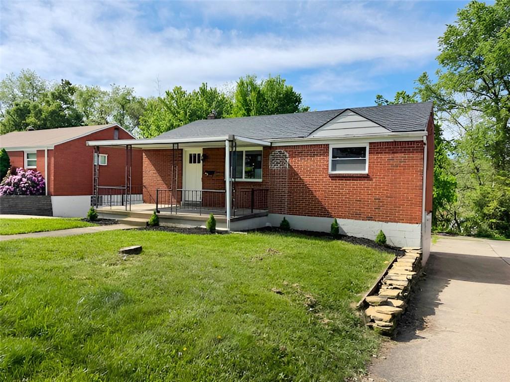 279 Olympic Road Pittsburgh, PA 15236 - Photo 2 of 25 a front view of house with yard and green space