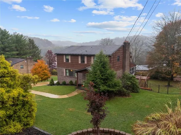 a view of a big yard next to a house