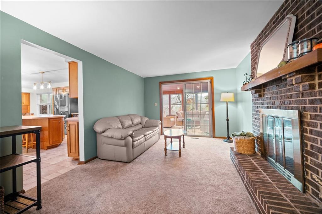 2924 Arrowhead Court Export, PA 15632 - Photo 11 of 37 a living room with furniture and a fireplace