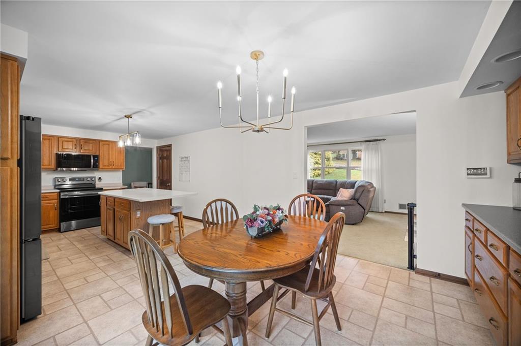 2924 Arrowhead Court Export, PA 15632 - Photo 13 of 37 a dining room with furniture and chandelier