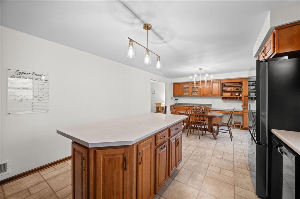 2924 Arrowhead Court Export, PA 15632 - Photo 15 of 37 a view of a dining room with furniture and a chandelier