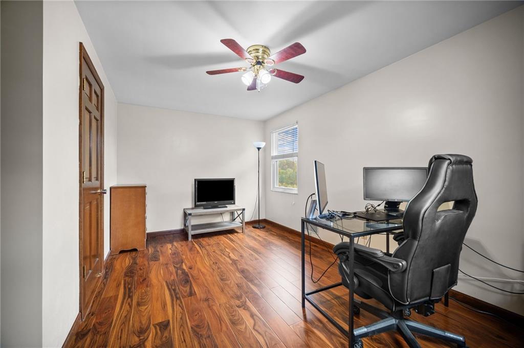 2924 Arrowhead Court Export, PA 15632 - Photo 17 of 37 a work room with furniture and a flat screen tv