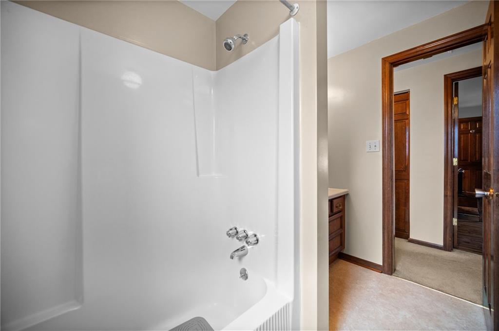 2924 Arrowhead Court Export, PA 15632 - Photo 19 of 37 a bathroom with a bathtub and a shower