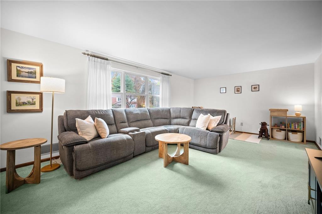 2924 Arrowhead Court Export, PA 15632 - Photo 9 of 37 a living room with furniture and a lamp