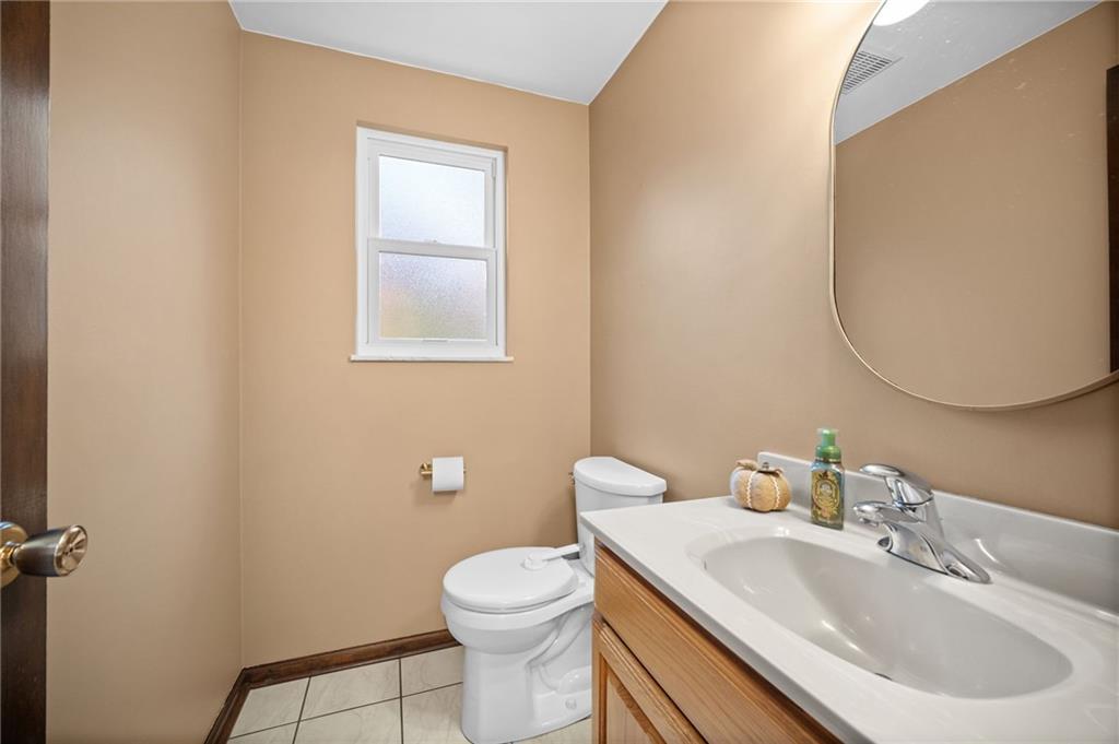 2924 Arrowhead Court Export, PA 15632 - Photo 10 of 37 a bathroom with a sink a toilet and a mirror