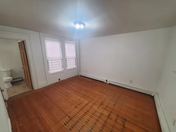 a view of empty room with front door
