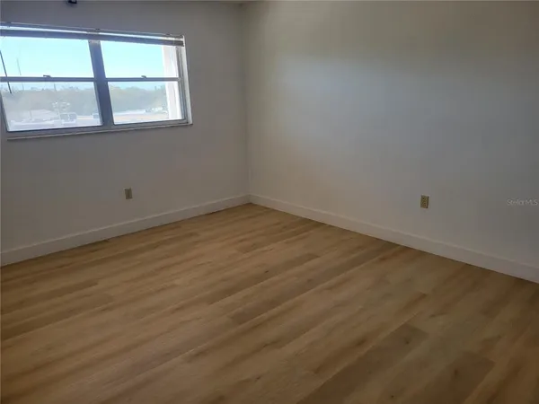 an empty room with a window