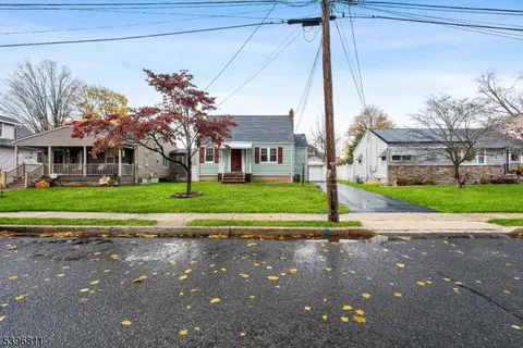 a front view of house with yard
