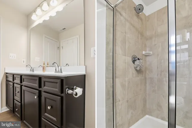 a living room with furniture and a lamp