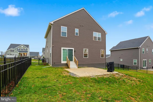 a picture of a room with a floor and white wall