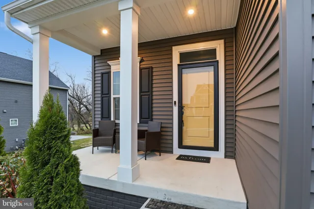 a view of entryway with wooden floor