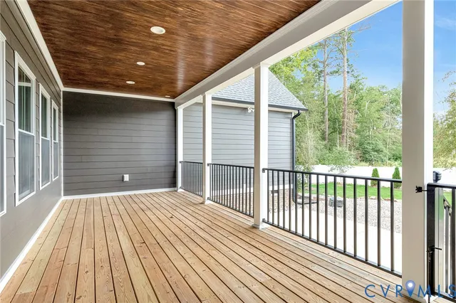 a balcony with wooden floor