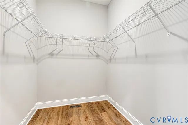 a view of a room with racks on the wall