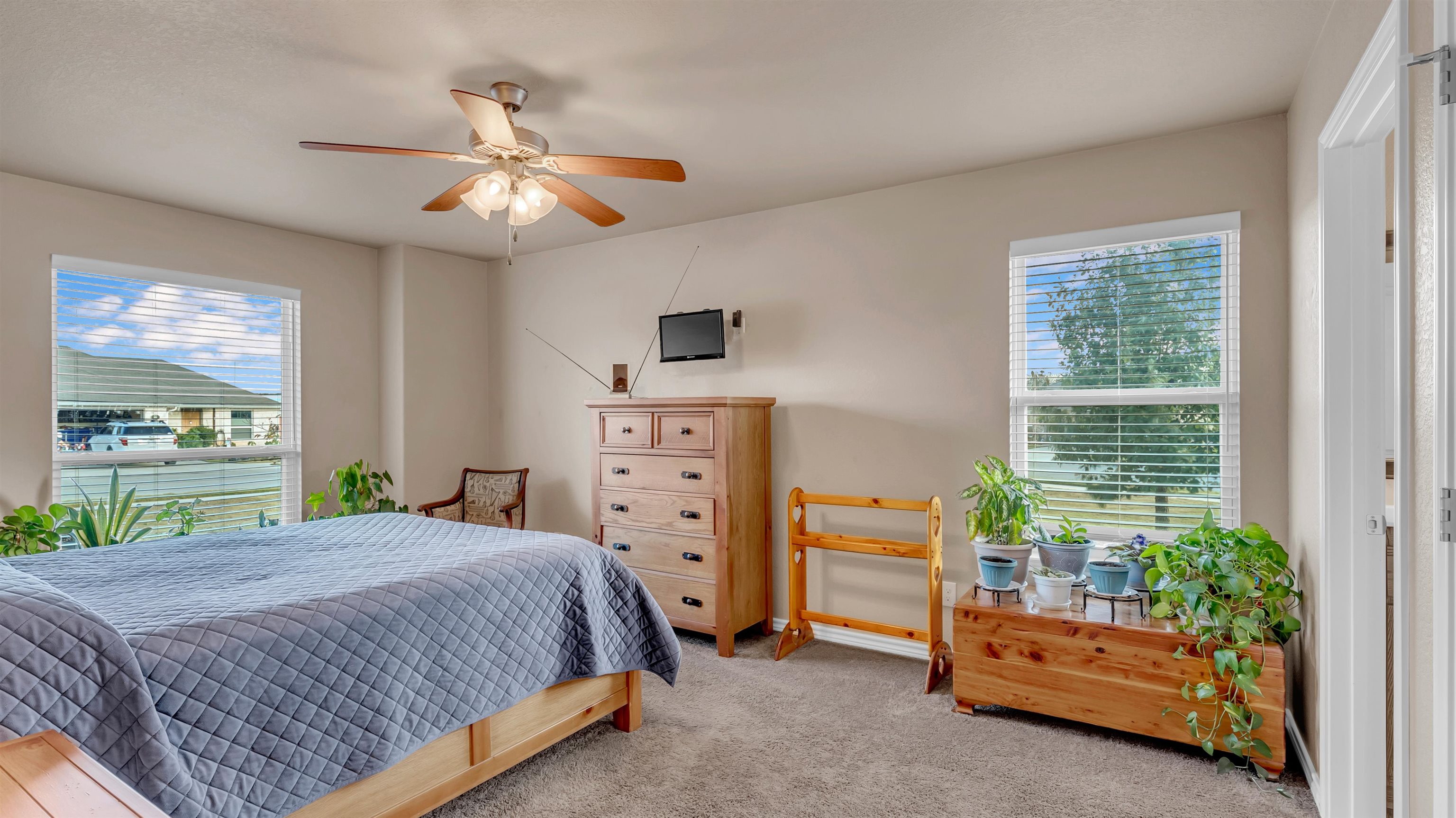 140 Rylee Road Burnet, TX 78611 - Photo 15 of 23 a bedroom with a bed and a window