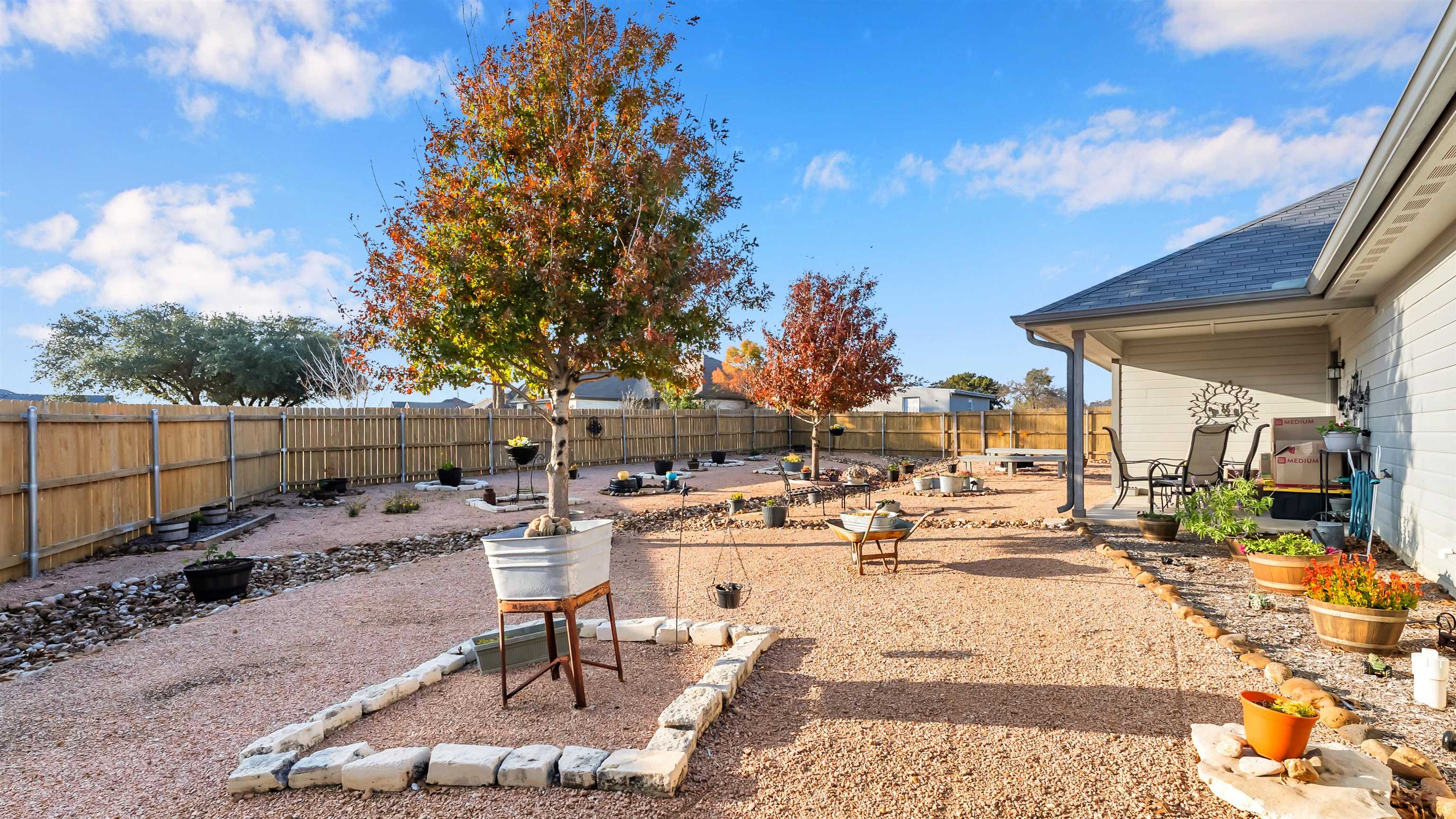 140 Rylee Road Burnet, TX 78611 - Photo 20 of 23 a view of a patio with furniture and a fire pit