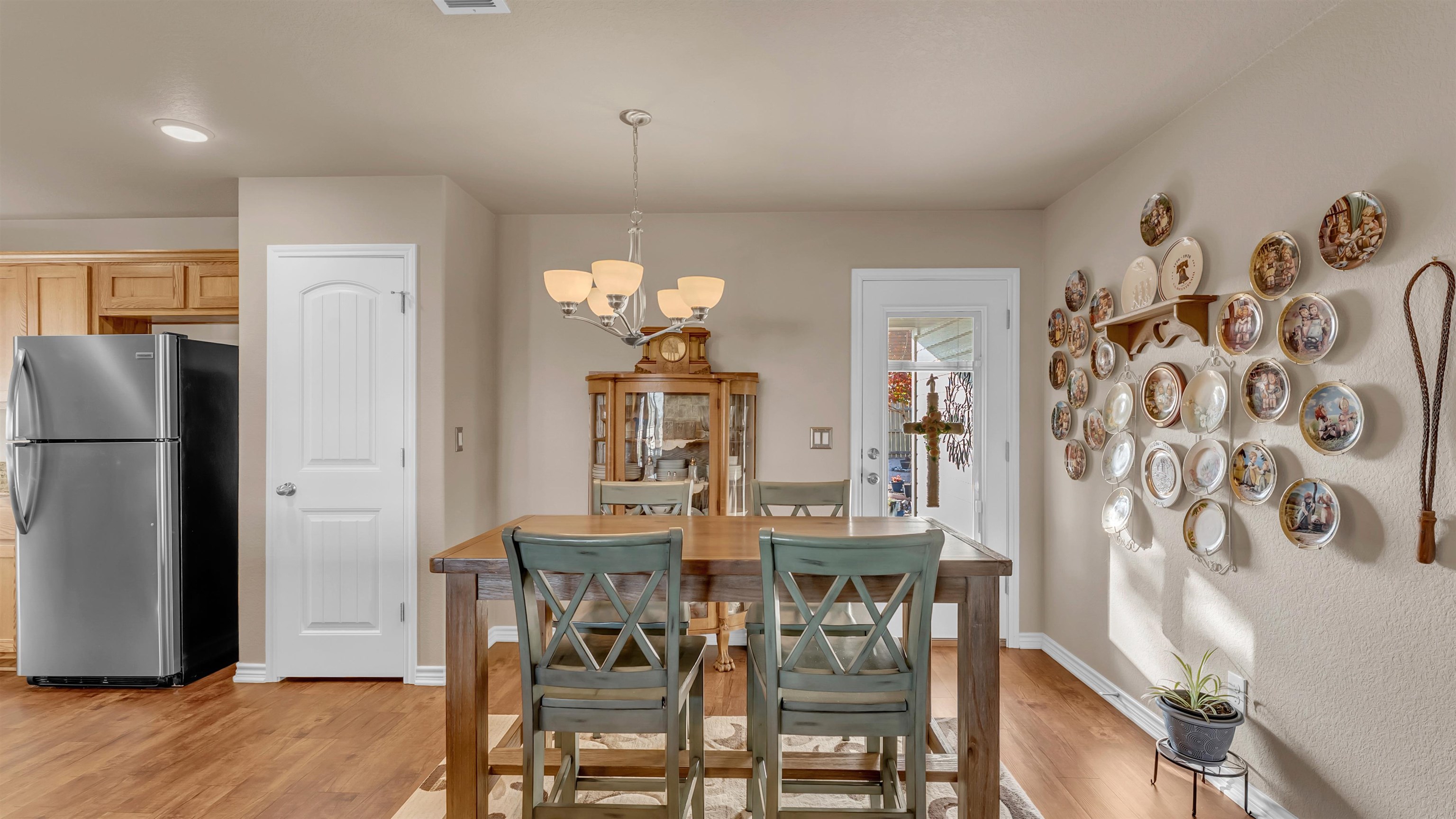 140 Rylee Road Burnet, TX 78611 - Photo 10 of 23 a view of a dining room with furniture and wooden floor