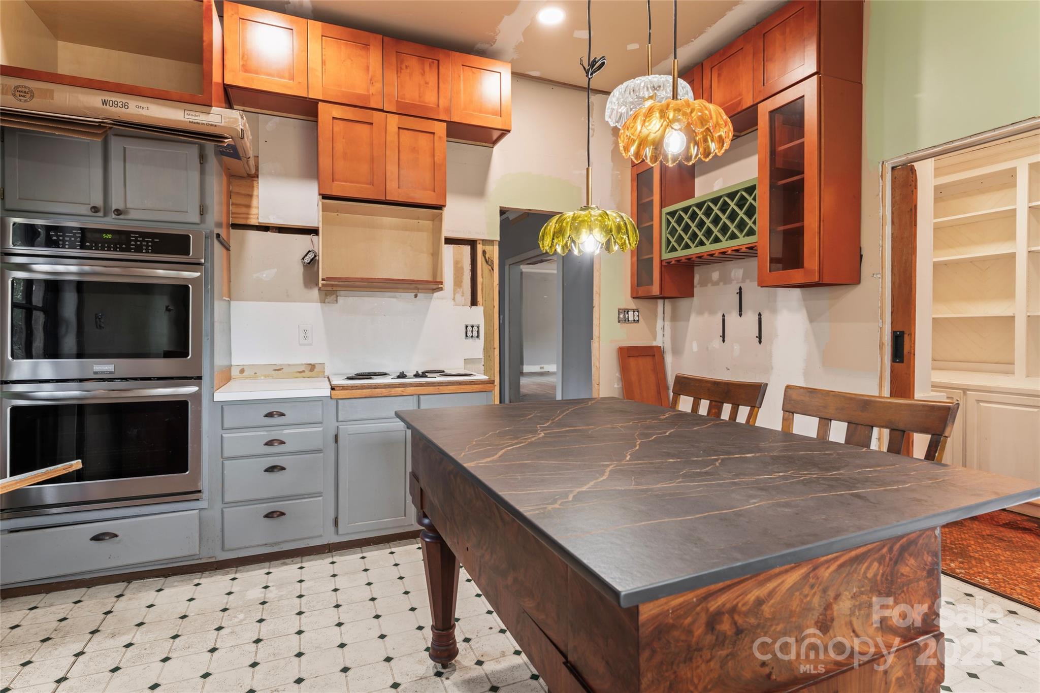 701 South Fulton Street Salisbury, NC 28144 - Photo 15 of 21 a kitchen with stainless steel appliances granite countertop a sink and a microwave
