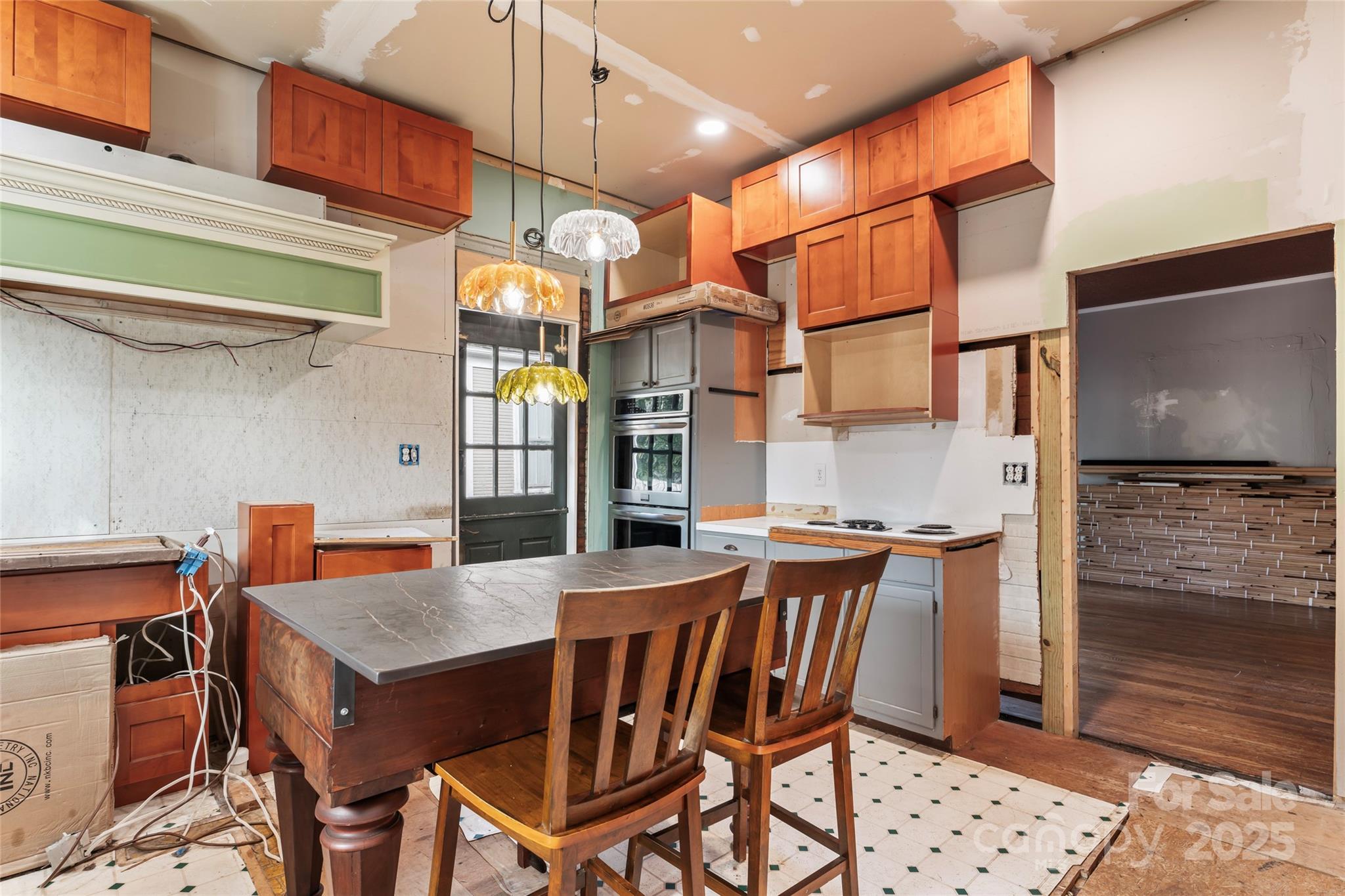 701 South Fulton Street Salisbury, NC 28144 - Photo 16 of 21 a view of a dining room with furniture