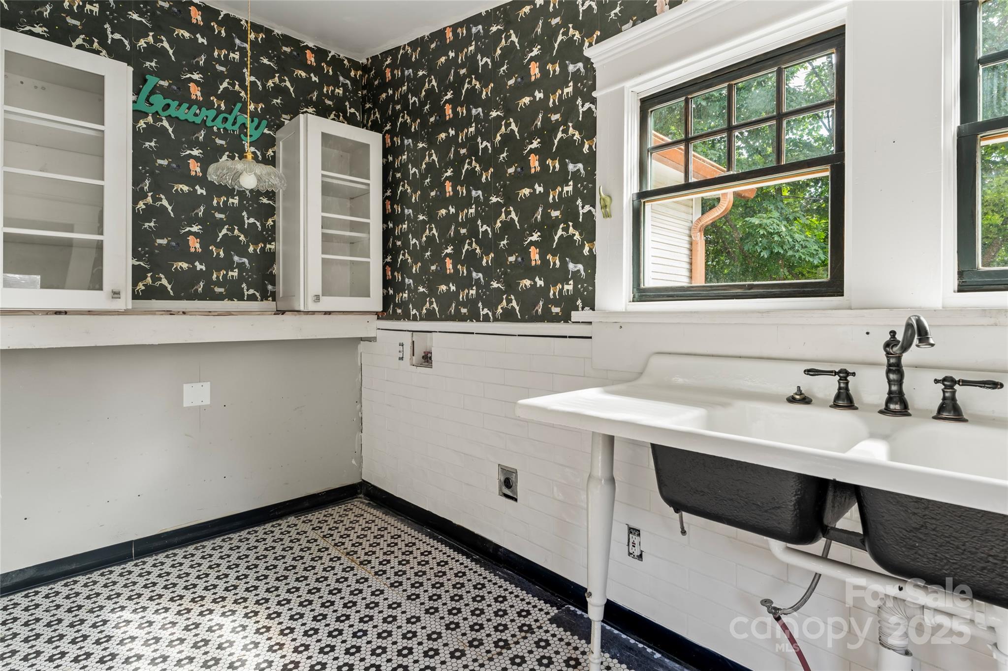 701 South Fulton Street Salisbury, NC 28144 - Photo 17 of 21 a bathroom with a sink and a window