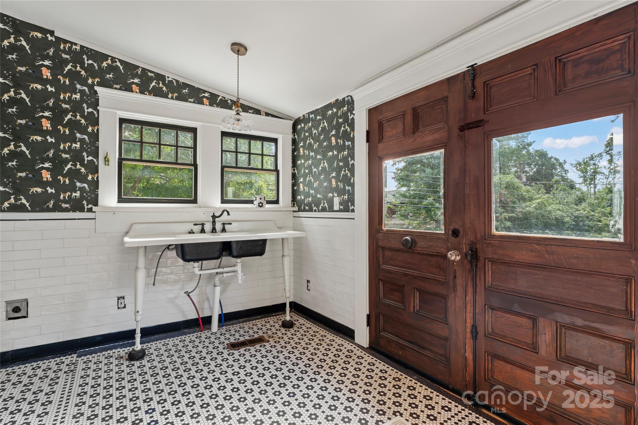 701 South Fulton Street Salisbury, NC 28144 - Photo 18 of 21 a kitchen with a sink and large window