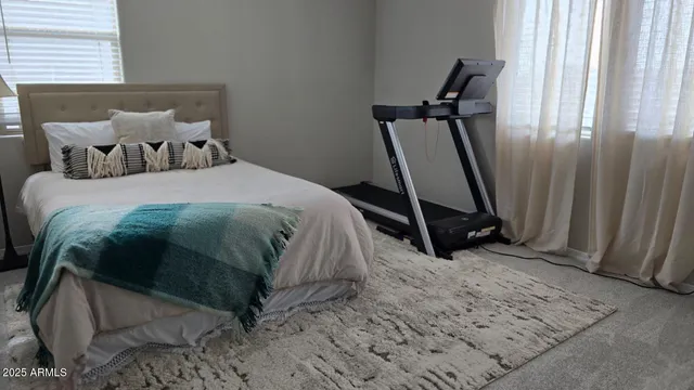 a view of an outdoor sitting area with furniture and backyard