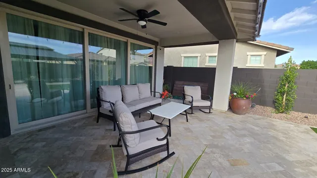 a kitchen with stainless steel appliances granite countertop a sink a refrigerator and a stove