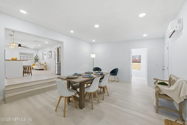 a view of a dining room with furniture